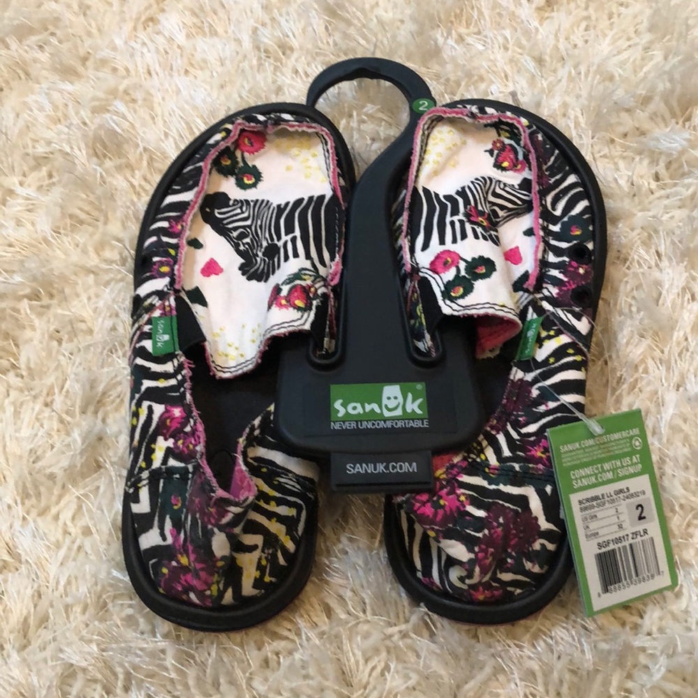 Sanuk sidewalk surfer. Girls size 2
